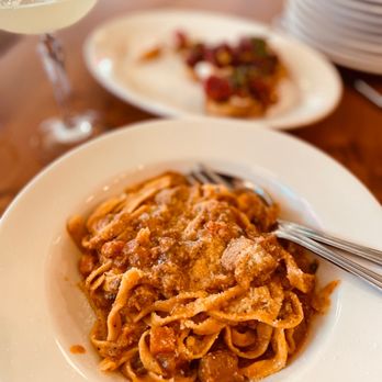 Quartino Grandscape signature dishes Margherita PizzaPorcini & Truffle RisottoPappardelle al Sugo di Manzo